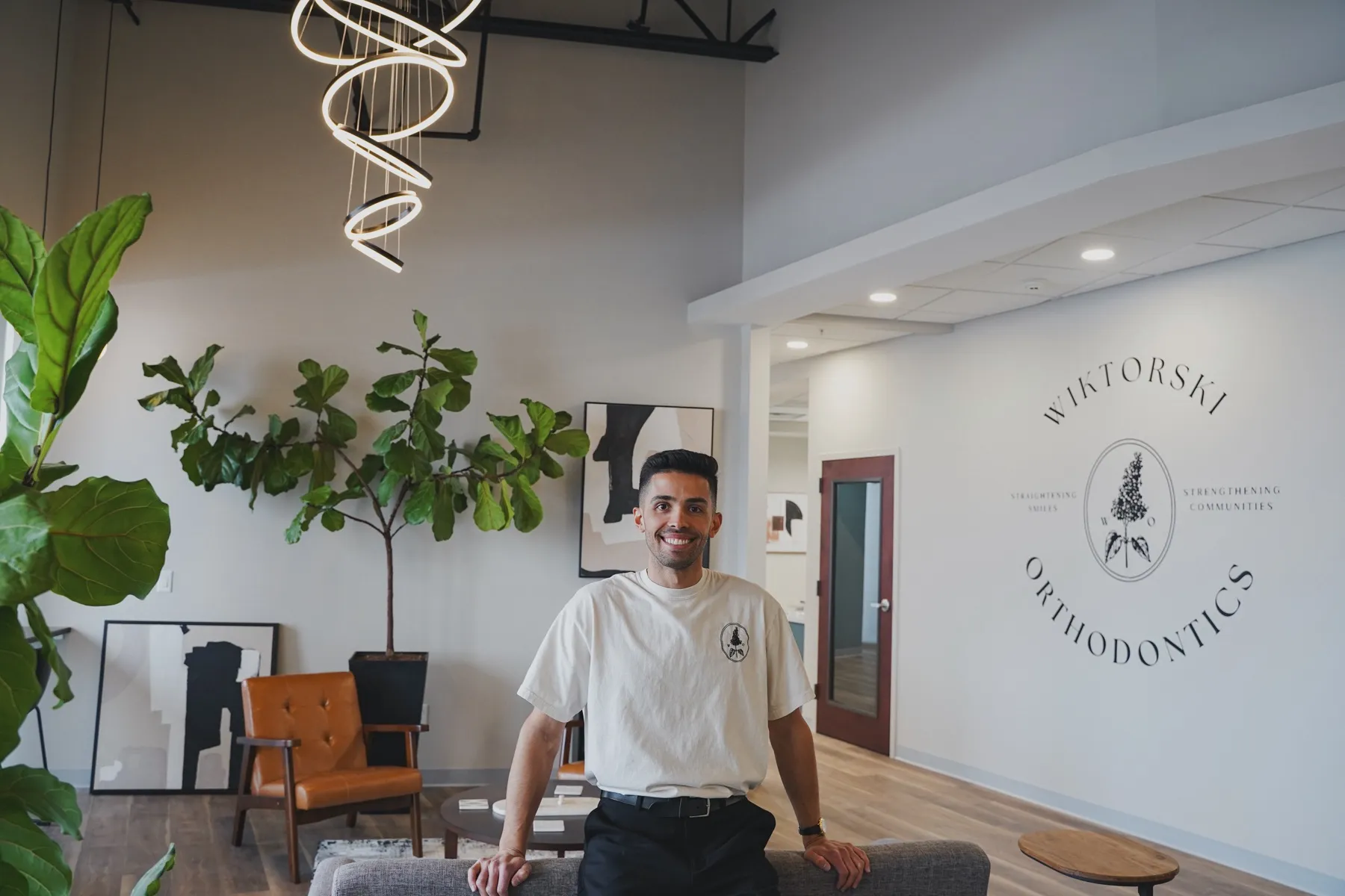 Dr. Cody Wiktorski standing in the Wiktorski Orthodontics office in Webster, NY