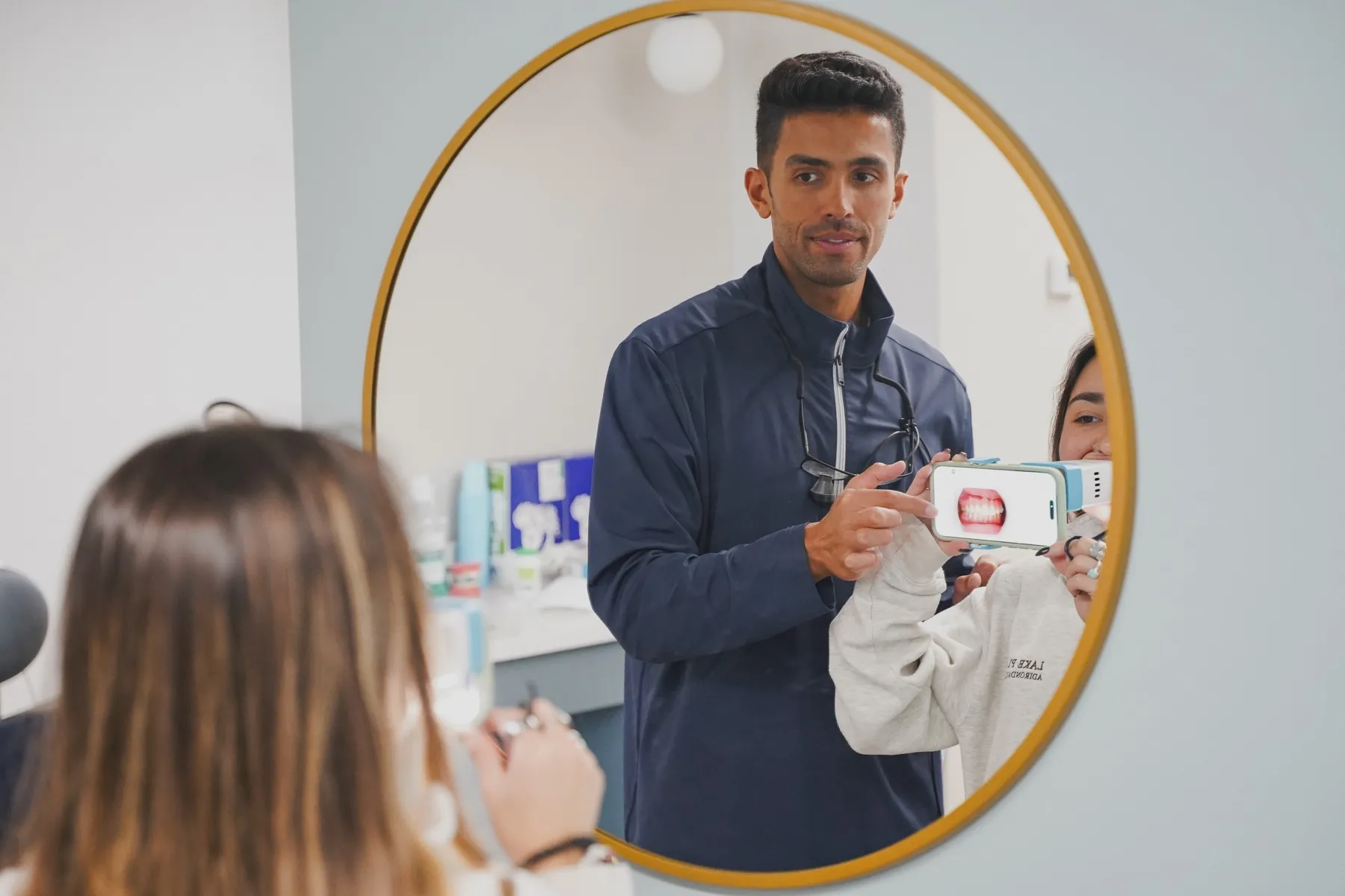 Dr. Wiktorski showing a patient her scan during a consultation